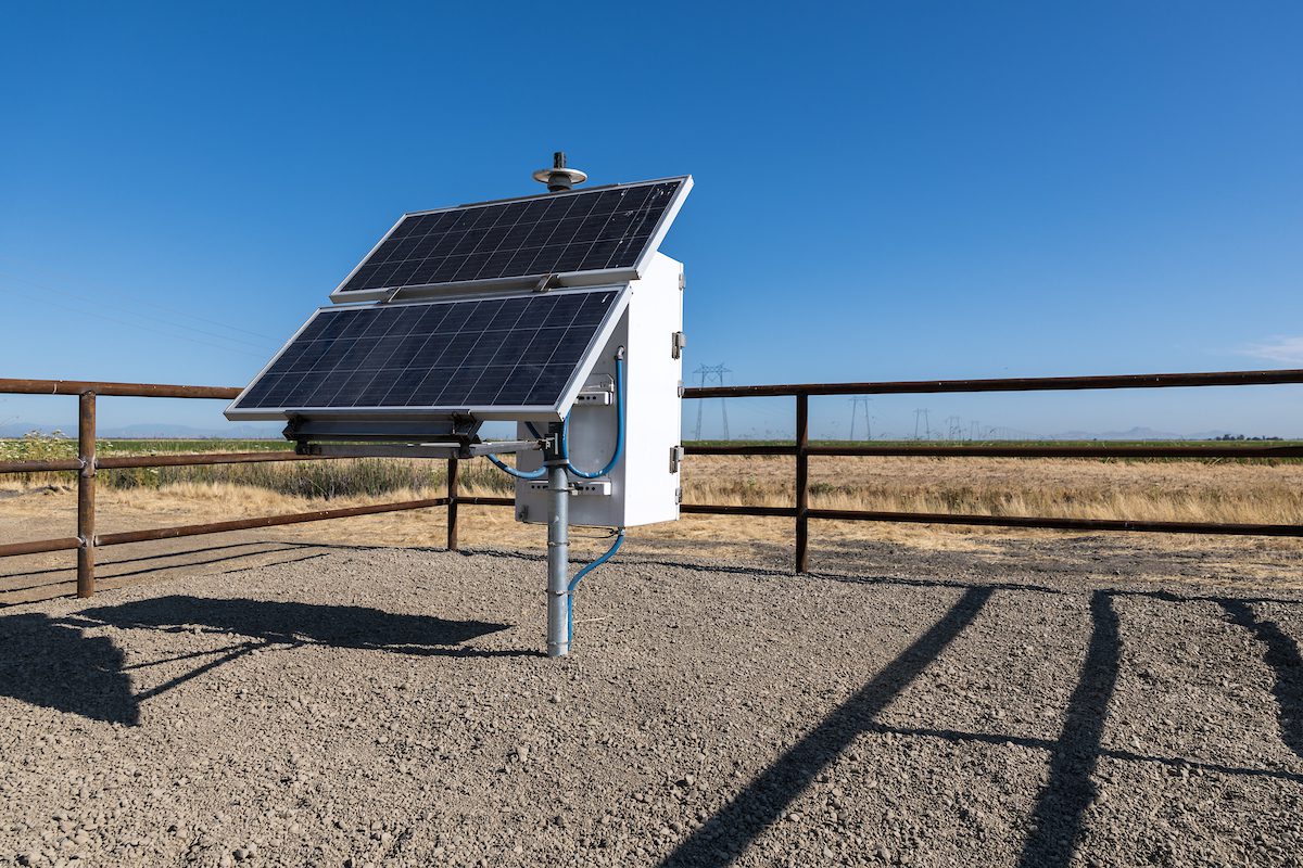 Newly installed equipment from the California Department of Water Resources' Sustainable Groundwater Management Office to enhance the monitoring and understanding of land subsidence in California.  The newly installed GPS station and remote sensing calibration equipment are firmly anchored into the ground to ensure precise positioning and detect vertical movement of the Earth’s surface. Photo taken July 2, 2025. Nick Shockey / California Department of Water Resources