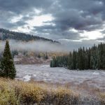 A flooding river in Colorado, autumn